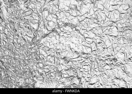 Pattern of Wrinkled Aluminium Foil Paper using as background Stock Photo