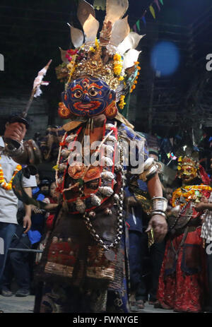 Kathmandu, Nepal. 06th Apr, 2016. A masked dancer dressed up as deity performs in the 'Devi Pyankha' (Devi Dance in local language) to mark the Pahan Charhe, a day prior to Ghode Jatra festival in Kathmandu, Nepal. © Archana Shrestha/Pacific Press/Alamy Live News Stock Photo