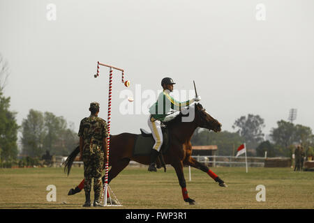 Kathmandu, Nepal. 7th Apr, 2016. A Nepalese soldier performs horse riding skills during the Ghode Jatra celebrations in Kathmandu, Nepal, April 7, 2016. Nepal's Army usually organizes horse racing, acrobatics performance and other activities to mark the traditional Ghode Jatra, or horse racing festival. Credit:  Pratap Thapa/Xinhua/Alamy Live News Stock Photo