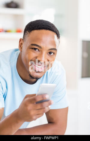Happy man using mobile phone Stock Photo
