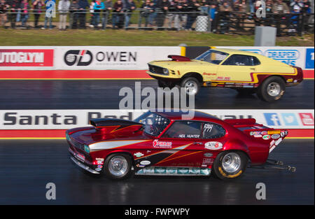 Pro ET drag racing at Santa Pod Raceway. Neil Hunter Ford Capri nearside V Tony Harter Ford Mustang far side. Stock Photo