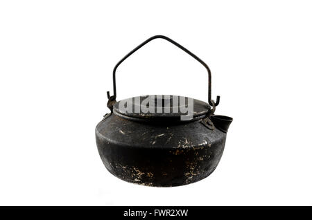 Sooty coffee kettle used for making coffee on campfire, isolated on white. Stock Photo