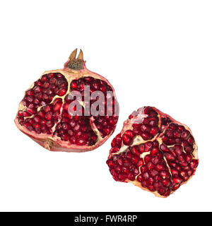 Halves of a juicy pomegranate, isolated on white background Stock Photo