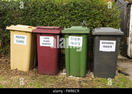 Domestic waste and recycling bins  for paper and card,  cans,  plastic and bottles, food and garden waste, and  general waste. Stock Photo