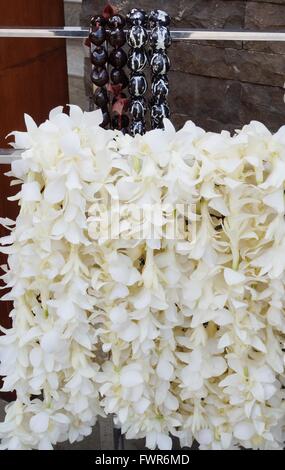 Fragrant white tuberose flower lei necklaces awaiting visitors in ...