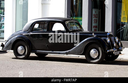 A 1953 RME Riley parked along a side street on a sunny spring afternoon in Dundee, UK Stock Photo