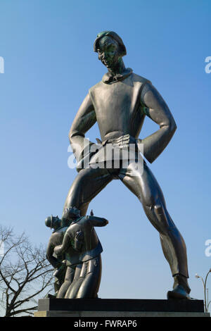 Statue Lange Wapper,1962 by Albert Poels in front of the Steen Castle on banks of Schelde river in Antwerp, Belgium Stock Photo