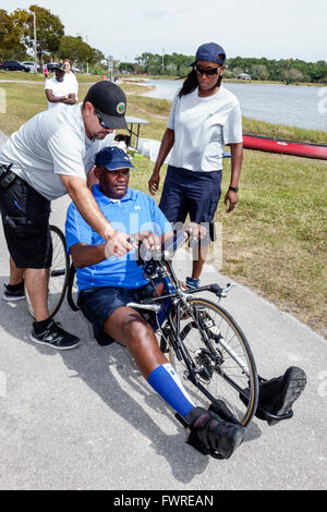 Miami Florida,Tropical Park,Paralympic Experience,sports,hand,cycle,Black adult,adults,man men male,disabled,volunteer volunteers volunteering work wo Stock Photo