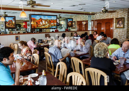 Miami Florida,El Chalan,restaurant restaurants food dining eating out cafe cafes bistro,Peruvian,food,cuisine,interior inside,tables,customers,Hispani Stock Photo