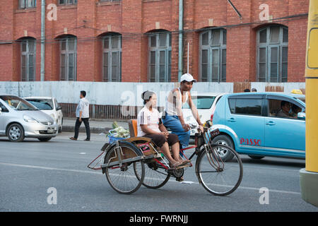 Rickshaw driver, Yangon, Myanmar Stock Photo