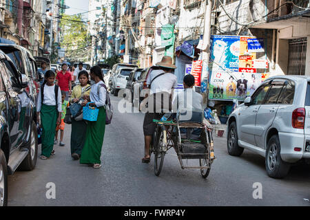 Rickshaw driver, Yangon, Myanmar Stock Photo