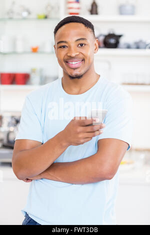 Happy man using mobile phone Stock Photo