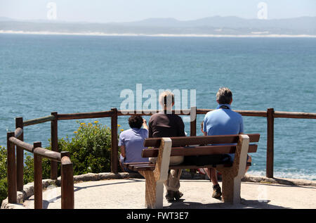 Whale watchers at Hermanus in South Africa Stock Photo