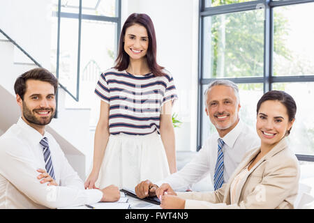 Workers are posing and smiling Stock Photo