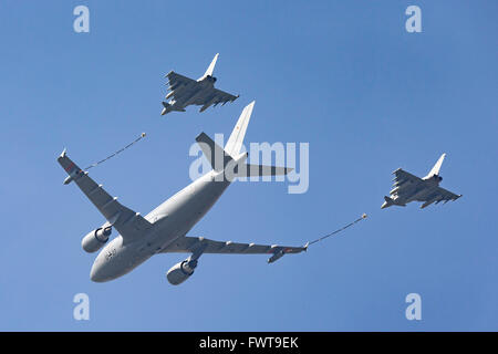 German Air Force (Luftwaffe) Airbus A310-304 MRTT (Multi-role Tanker Transport) aircraft with two Eurofighter Typhoon fighters Stock Photo