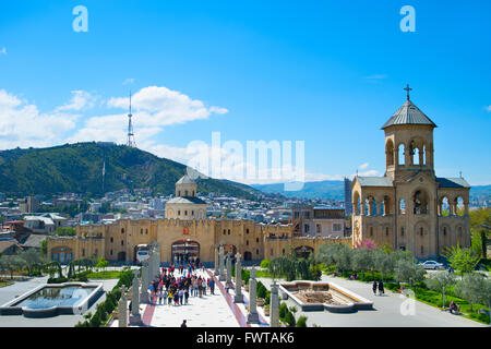 Tourists visiting  the Holy Trinity Cathedral of Tbilisi, commonly known as Sameba. Stock Photo