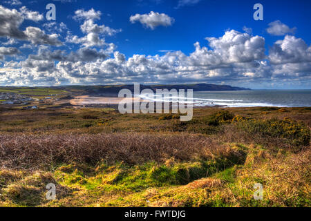 Widemouth Bay North Cornwall near Bude UK with blue sky and bright white clouds on a beautiful sunny day in HDR Stock Photo