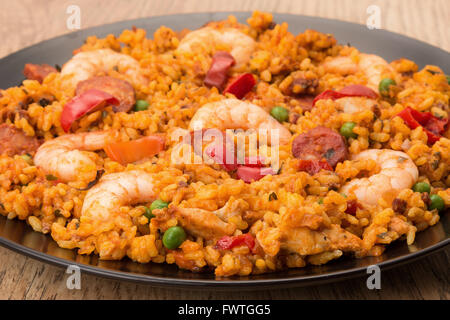 Seafood shrimp, chorizo and chicken paella - studio shot Stock Photo