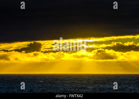 Sunset and storm clouds seen from Kihei area of Maui Stock Photo