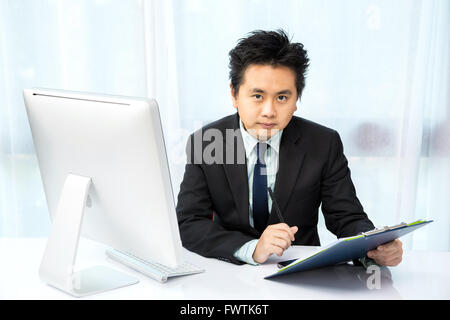 businessman working with desktop computer Stock Photo