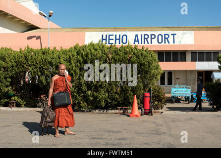 Buddhist monk at Heho airport near Inle Lake, Burma (Myanmar) Stock Photo