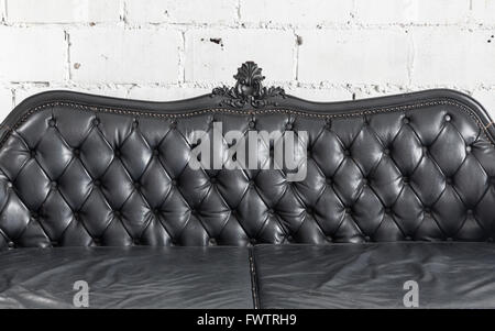 Armchair black genuine leather classical style sofa Stock Photo