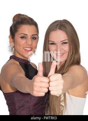 Two attrative women giving a thumbs up Stock Photo