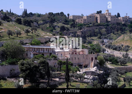 St. Andrews Church on top of the hill and the Greek Orthodox Monastery of St Onuphrius in Aceldama or Akeldama also spelt Aceldama, Hekeldama and Hakeldama on the southern face of Hinnom valley the modern name for the biblical Gehenna or Gehinnom valley surrounding Jerusalem's Old City, Israel Stock Photo