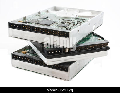 A stack of 3 internal hard drives Stock Photo