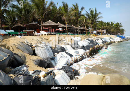 Erosion at seaside restaurant from climate change situation, wave broken dike, very unsafe, danger, environment risk of worldwid Stock Photo