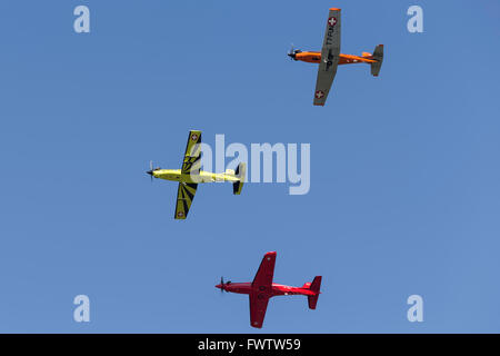 Formation of Swiss built Pilatus training aircraft comprising a PC-7, PC-9 and PC-21 Stock Photo