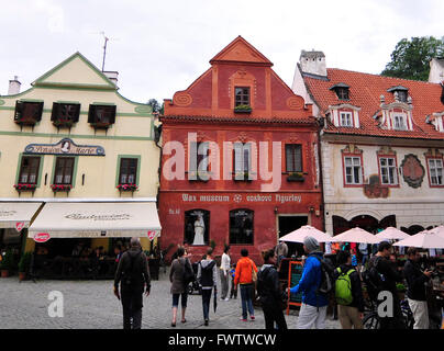 Tourist waking by the Wax museum in the beautiful old town of Cesky Krumlov in Southern Bohemia. Stock Photo