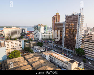 Architecture in downtown of Dar es Salaam, Tanzania, East Africa, in the evening, at sunset. Horizontal orientation, wide angle. Stock Photo