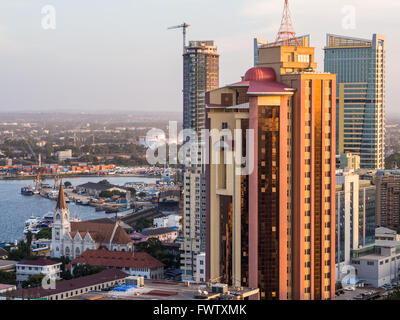 Architecture in downtown of Dar es Salaam, Tanzania, East Africa, in the evening, at sunset. Horizontal orientation. Stock Photo