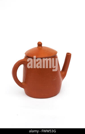 Brazilian handicraft clay teapot on white background Stock Photo