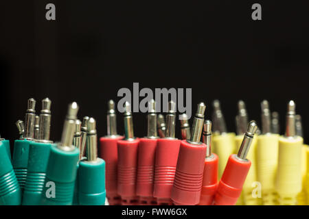 colorful audio cables macro on black background Stock Photo