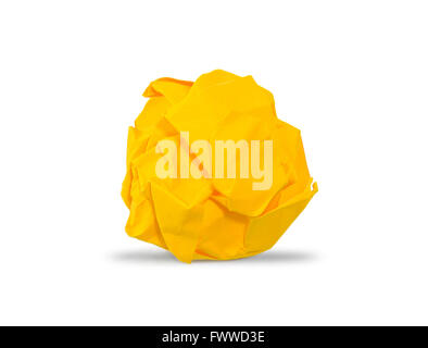 Yellow crumpled paper ball with shadows Stock Photo