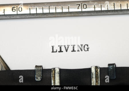 word living typed on old typewriter Stock Photo