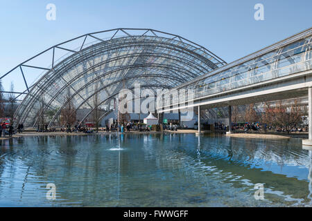 Trade fair with pond and footbridge, rear Neue Messe glass hall, book fair, Leipzig, Saxony, Germany Stock Photo