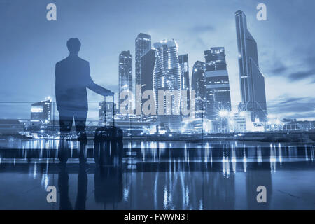 business travel, double exposure of passenger waiting in airport and modern city skyline Stock Photo