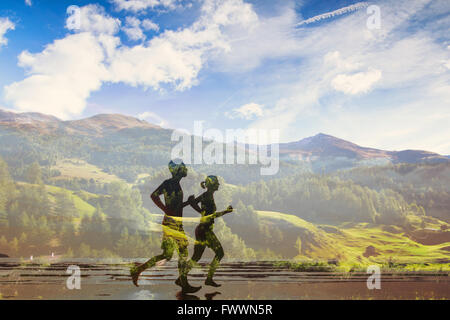 double exposure of two runners, eco trail in the nature, sport race competition, triathlon or marathon Stock Photo