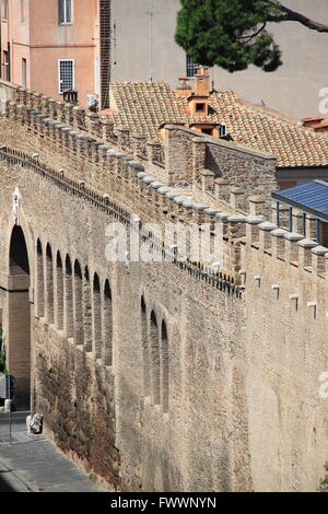 The Passetto (small passage) is a corridor atop the old Vatican wall between St. Peter Basilica and the Saint Angel Castle. Rome Stock Photo