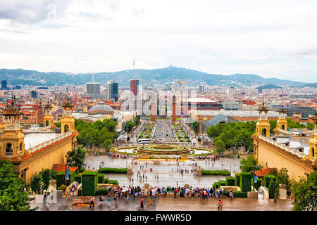 Plaza de Espana and Venetian towers on Montjuic in Barcelona in Spain. Placa Espanya is one of the most important and well-known squares in Barcelona. It is placed at the foot of Montjuic mountain Stock Photo