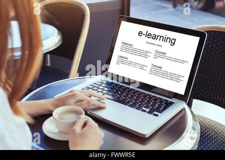 e-learning, education online concept, woman with laptop Stock Photo