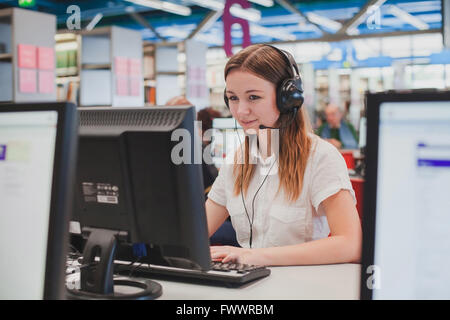 student working in computer class Stock Photo