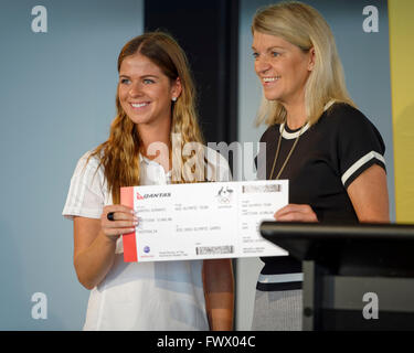 Sydney, Australia. 08 April, 2016: Glasgow 2014 Commonwealth Games gold medallist Laetisha Scanlan receives her boarding pass for Rio from Chef de Mission of the 2016 Australian Olympic Team Kitty Chiller at the Rio 2016 Australian Olympic Shooting Team Selection announcement in Sydney  Hugh Peterswald/Alamy Live News Stock Photo