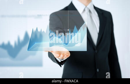 close up of man hand showing diagram chart Stock Photo