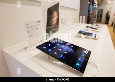 iPhone and iPads at the Jump+ Apple store in Kingston, Ont.,  on Wednesday Jan. 27, 2016. Stock Photo