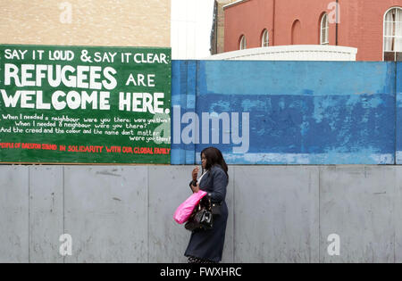 Pro-refugees and anti-Capitalism signs in Dalston, London Stock Photo