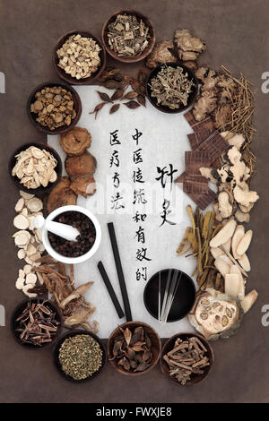 Chinese herbal medicine selection, acupuncture needles, moxa sticks and mandarin calligraphy script. Stock Photo
